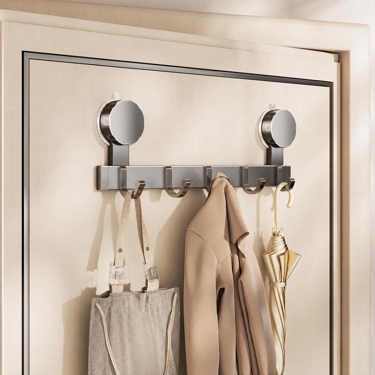 No-drill vacuum suction cup hook rack featuring chrome hooks with hanging coats and bags
