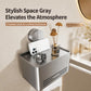 Grey no-drill suction cup tissue holder with front vents and roll storage shelf