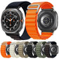 Orange woven nylon watch band with silver G-hook buckle, shown beside color options