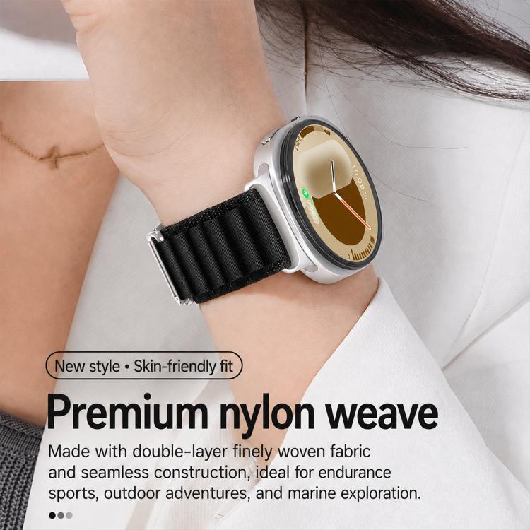 Black nylon watch band with a silver buckle, worn on a smartwatch