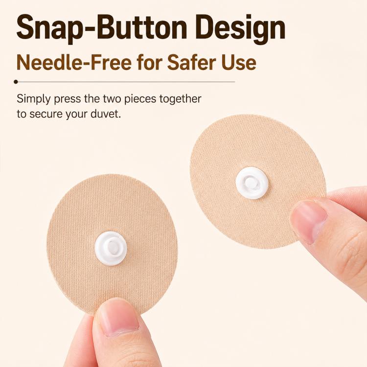 Snap-button duvet fastener discs, needle-free, shown being connected