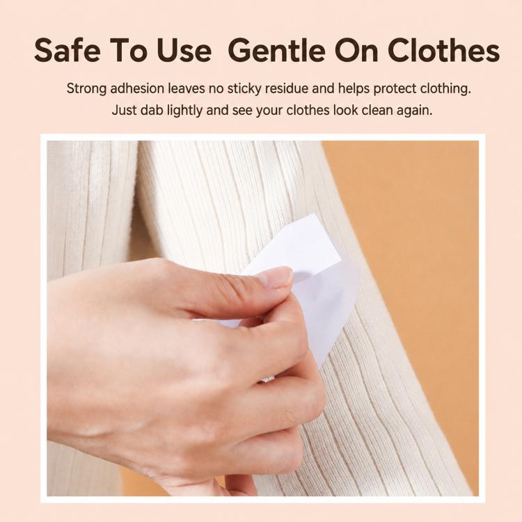 Disposable lint remover stickers dabbed on light fabric by hand
