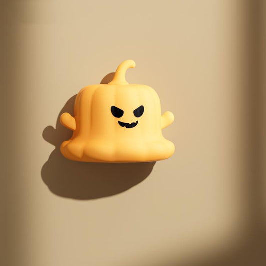Yellow silicone pumpkin ghost night light with smiling face, wall-mounted