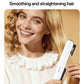 Hair straightener in hand smoothing blonde hair at the roots