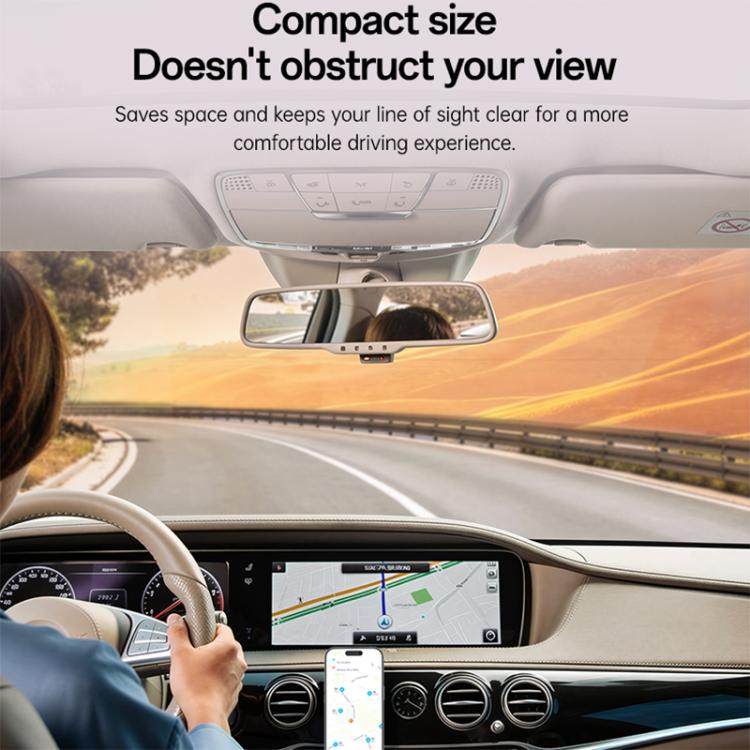 Compact black phone mount near rearview mirror on the windshield area.