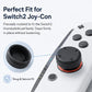 Black silicone thumbstick cap set shown attached and as detached replacements
