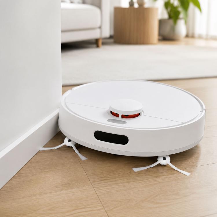Robot vacuum with white five-arm side brushes mounted underneath