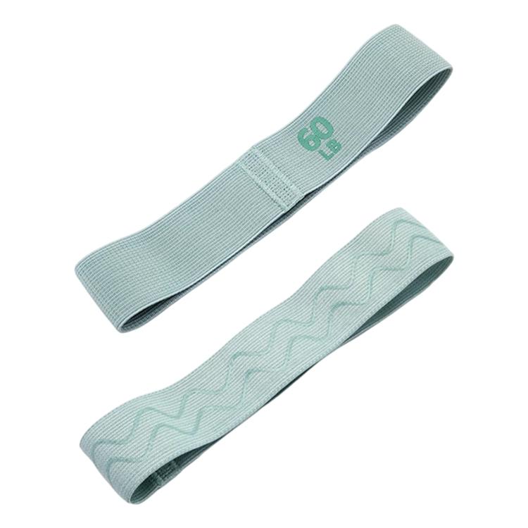 Green 60 lb resistance loop band, textured fabric elastic band with printed weight.