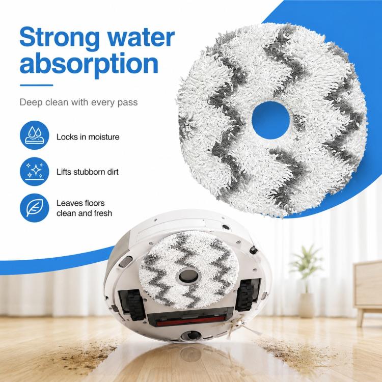 Round white microfiber mop pad with dark gray zigzag stripes beside robot vacuum