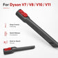 Long flat crevice tool with red top and black slim tip for handheld vacuum.