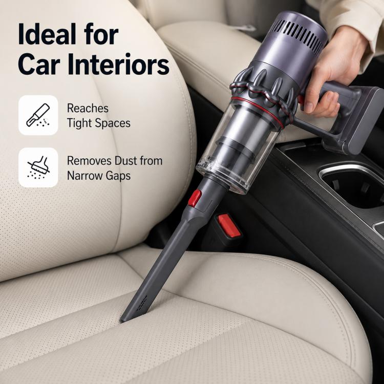 Long flat crevice tool cleaning car seat gap, dark gray head with red nozzle insert.