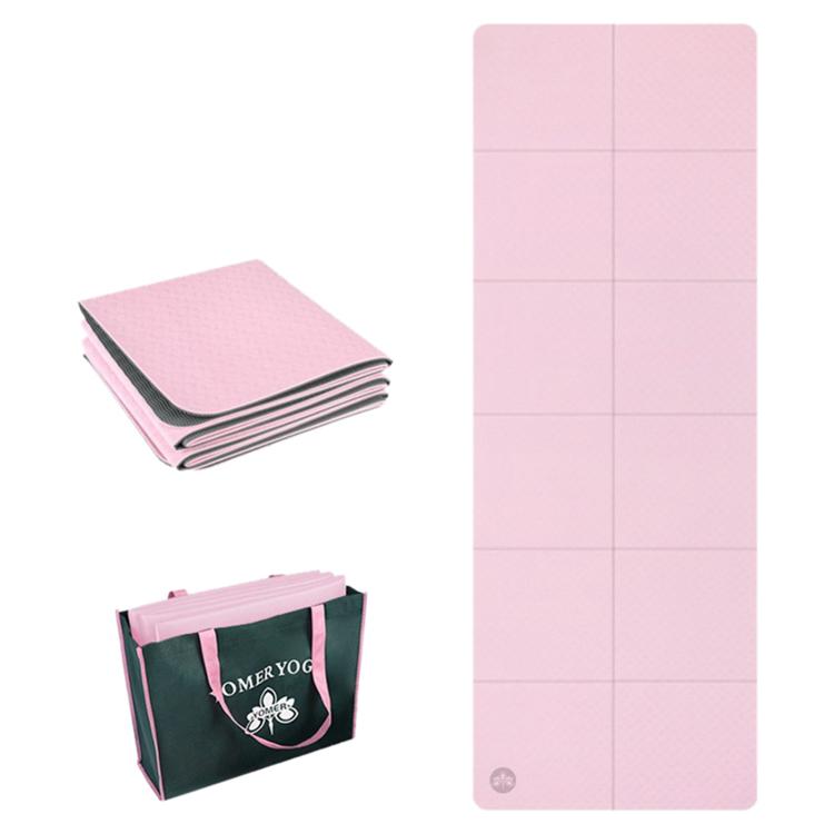 Foldable non-slip yoga mat, pink, 4mm thick with grid panels.