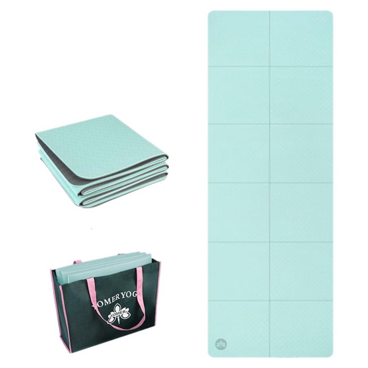 Foldable non-slip yoga mat, light green, 4mm thick with grid panels.