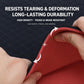Yoga mat rolled edge close-up, red underside and black top showing thickness
