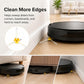 Robot vacuum side brush sweeping edges with yellow hub and white bristles