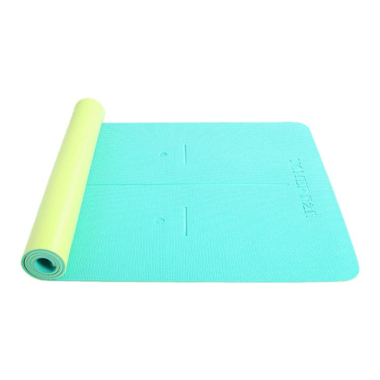 Lake green fitness training mat with textured surface and non-slip finish, rolled up.