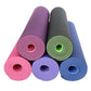 Assorted rolled non-slip yoga mats in pink, purple, green, gray, and blue colors