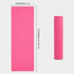 Pink non-slip yoga mat laid flat with length and width dimension marks