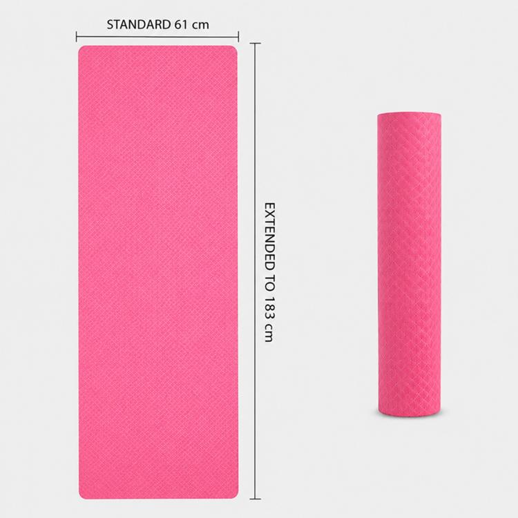Pink non-slip yoga mat laid flat with length and width dimension marks