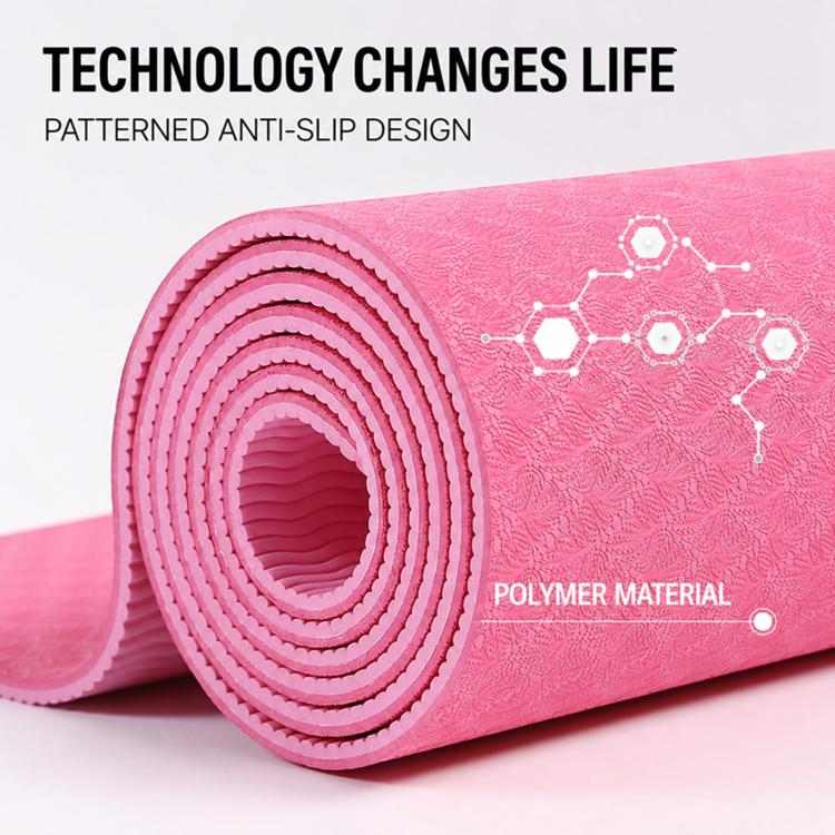 Pink non-slip yoga mat roll with layered anti-slip ridges on the surface