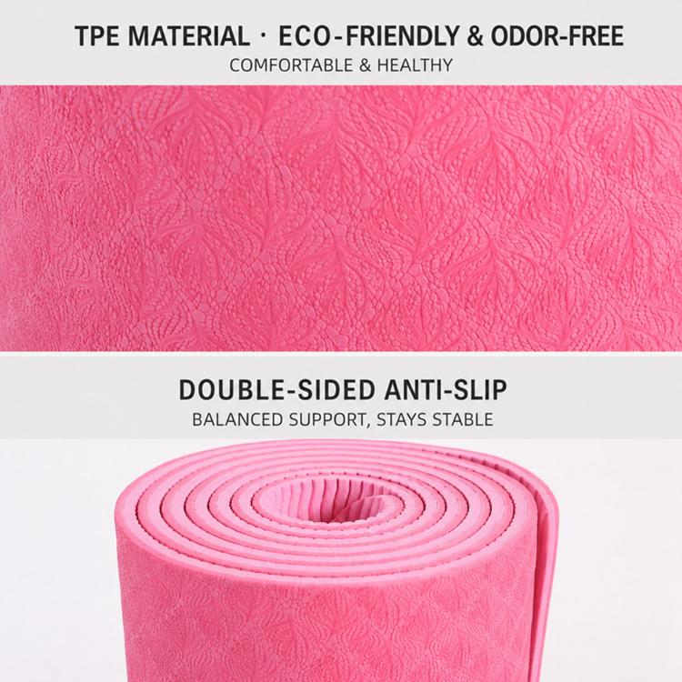 Pink double-sided non-slip yoga mat showing rolled spiral edge detail