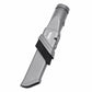 Gray retractable narrow brush head with stiff black bristles on vacuum attachment.