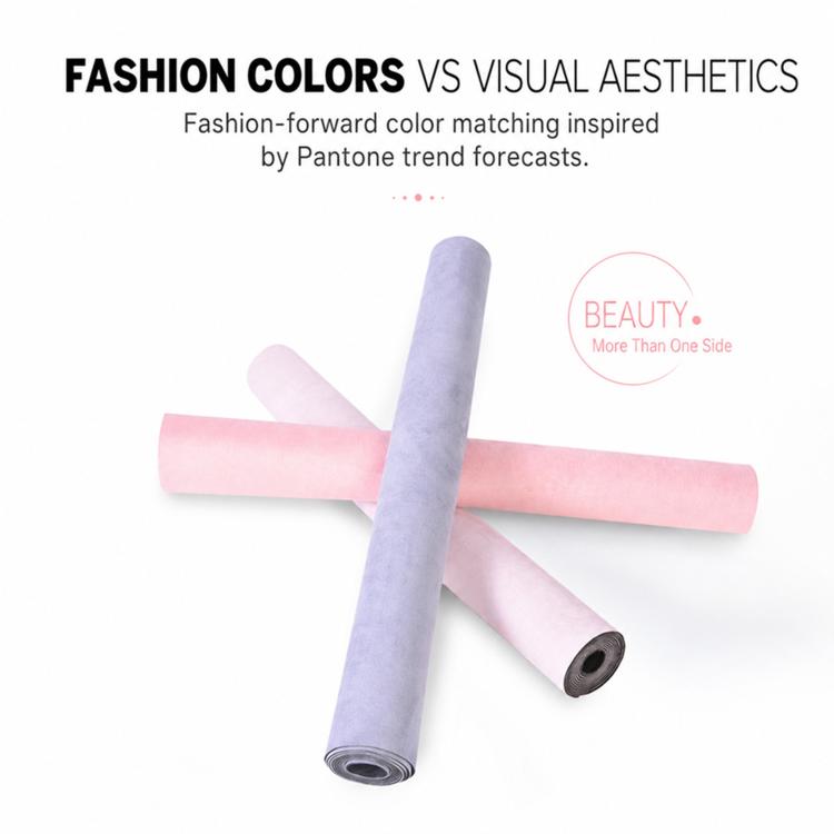 Rolled lavender and pink microfiber suede yoga mats with non-slip textured underside