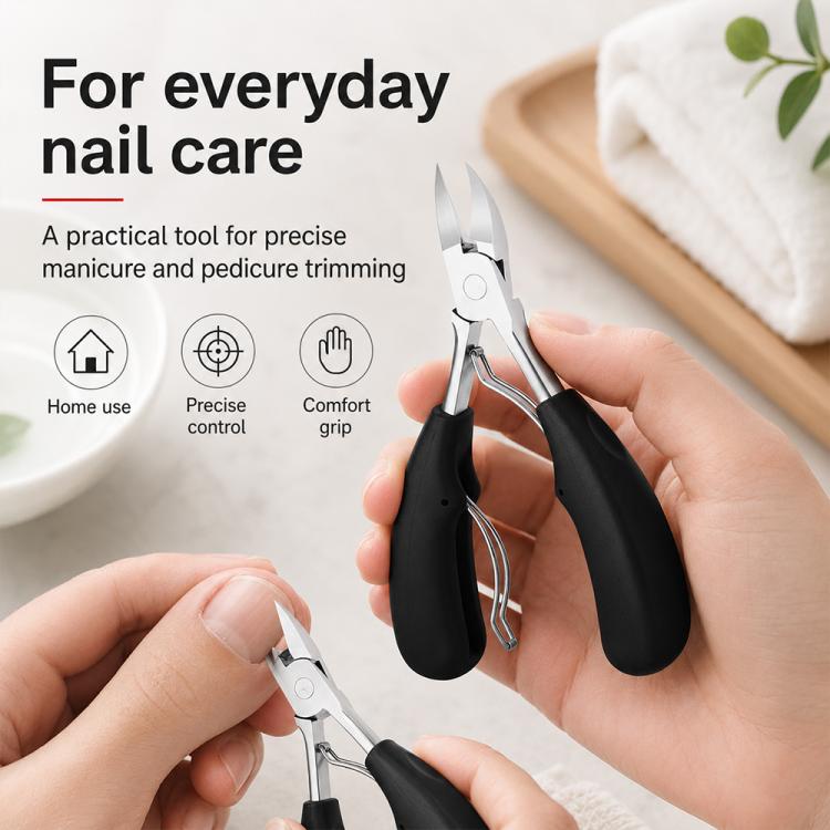 Stainless steel nail nipper held in hand for everyday trimming, black grip handles