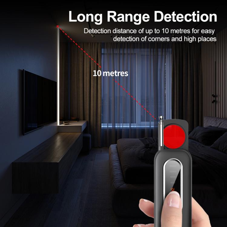 Handheld RF detector probe with red sensor and small antenna, held upright