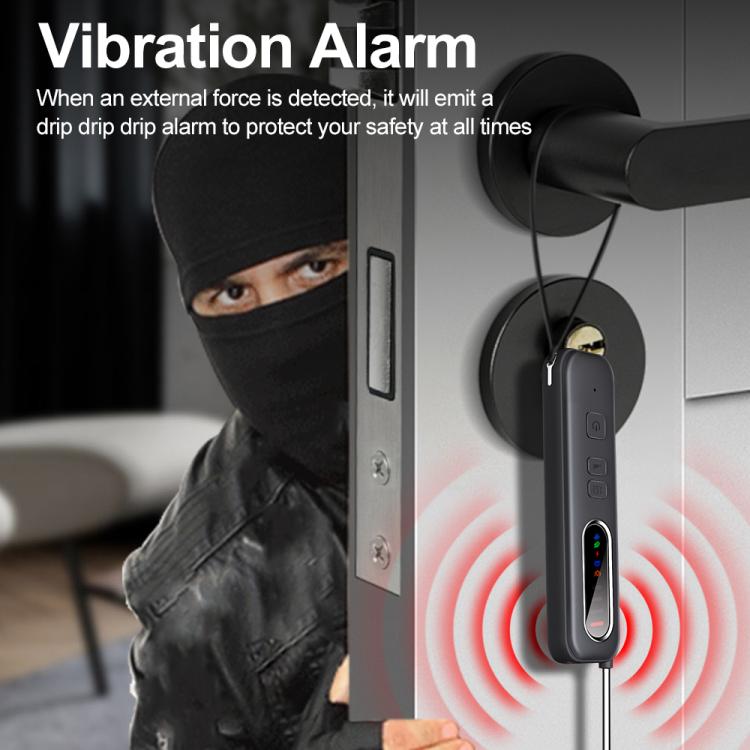Handheld RF detector with red sensor cap and LED indicators, in a wall/door setup