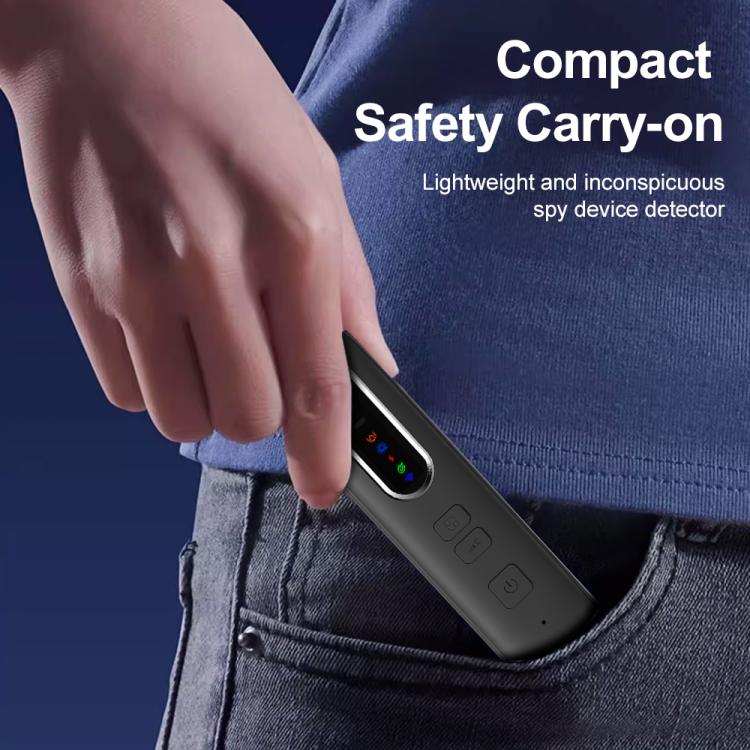 Compact handheld RF signal detector carried in a jeans pocket, red sensor visible