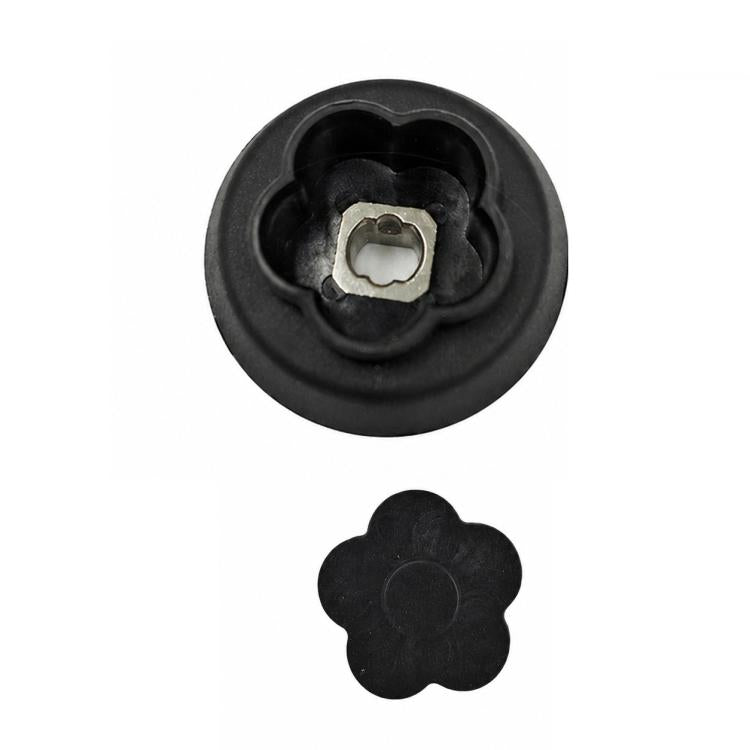 Black plastic blade motor coupling with metal square drive insert and flower-shaped cap
