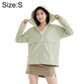 Sage green lightweight sun-protection coat with hood and zip front.