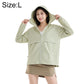 Pale green hooded sun protection coat with zip front and long sleeves with side pockets