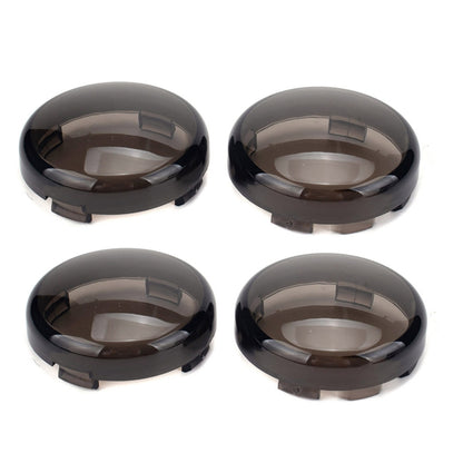 Set of four black motorcycle turn signal covers with smoked clear lenses