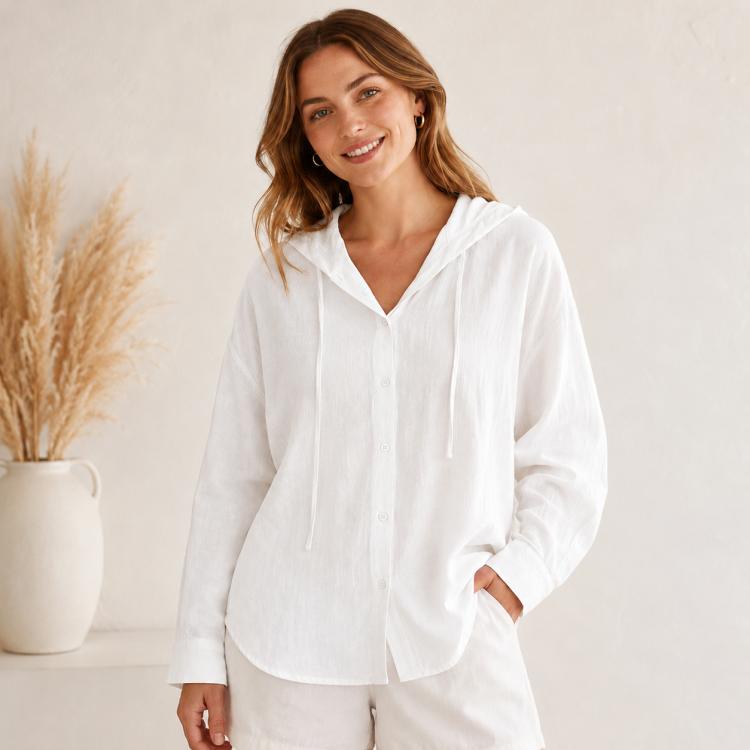 White hooded linen sun coat with long sleeves, button front, and drawstring hood