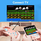 Hands holding pastel handheld retro consoles while a TV shows gameplay