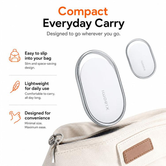 Xiaomi wireless smart tracker tag on beige zipper bag, white oval with silver edge