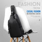 Black crossbody sling bag with adjustable strap and front zip compartments.