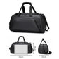 Black large capacity duffel bag with top handles and detachable shoulder strap