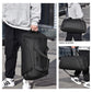 Black fitness duffel with separate wet-dry compartments and shoulder strap, front zip pocket.