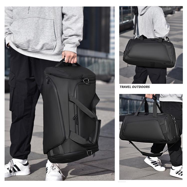 Black fitness duffel with separate wet-dry compartments and shoulder strap, front zip pocket.