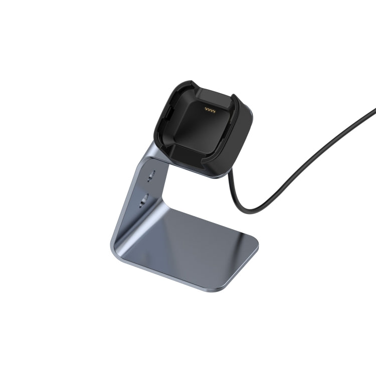 Grey aluminum alloy charger holder with black charging dock and attached cable
