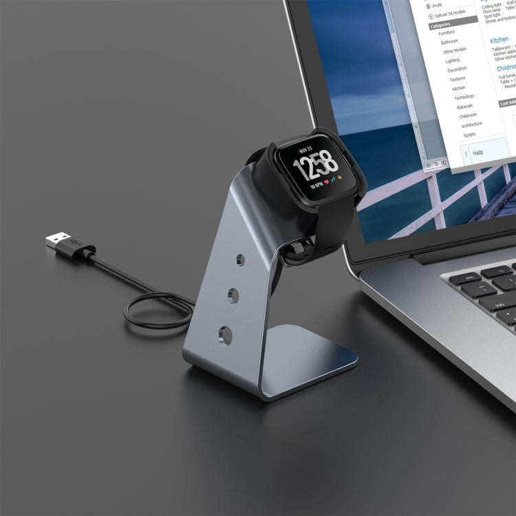 Grey aluminum alloy charger dock with black holder and connected charging cable