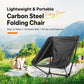 Black folding moon camping chair with mesh panel and curved backrest