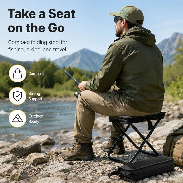 Black folding camping chair with zippered storage bag beside a seated angler