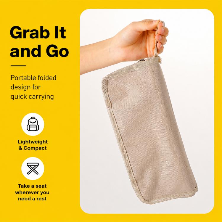 Light khaki zippered storage bag for a folded camping chair, carried in hand