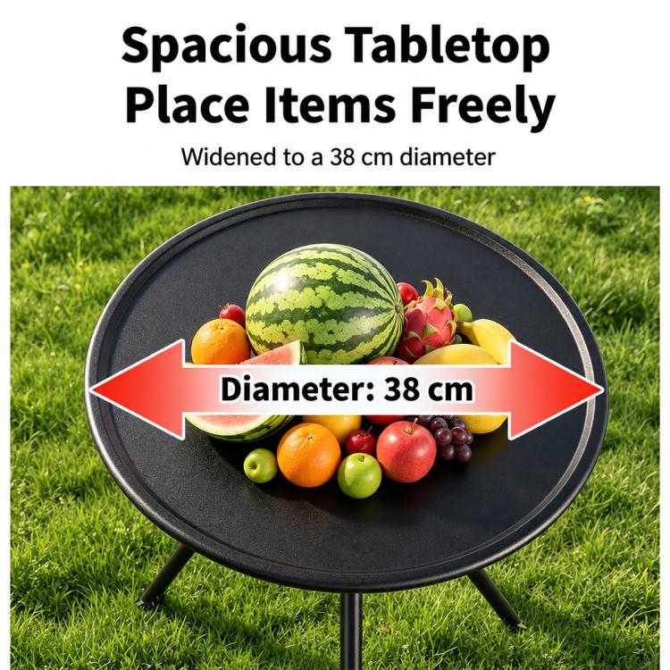 Round black camping table with wide tabletop for holding fruit