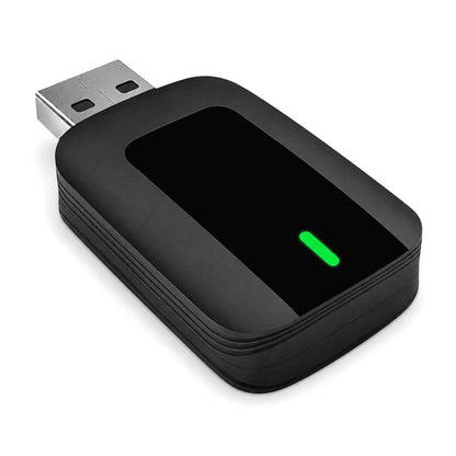 Black wireless car adapter with USB plug and green status light, compact 2-in-1 design