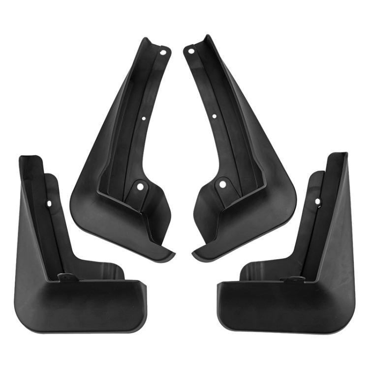 Four-piece black splash flap set for car fender wells, includes mounting holes.